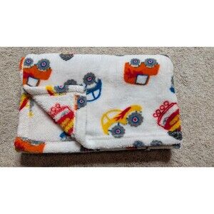 Cutie Pie White Monster Trucks Fleece Baby Blanket 30 X 36